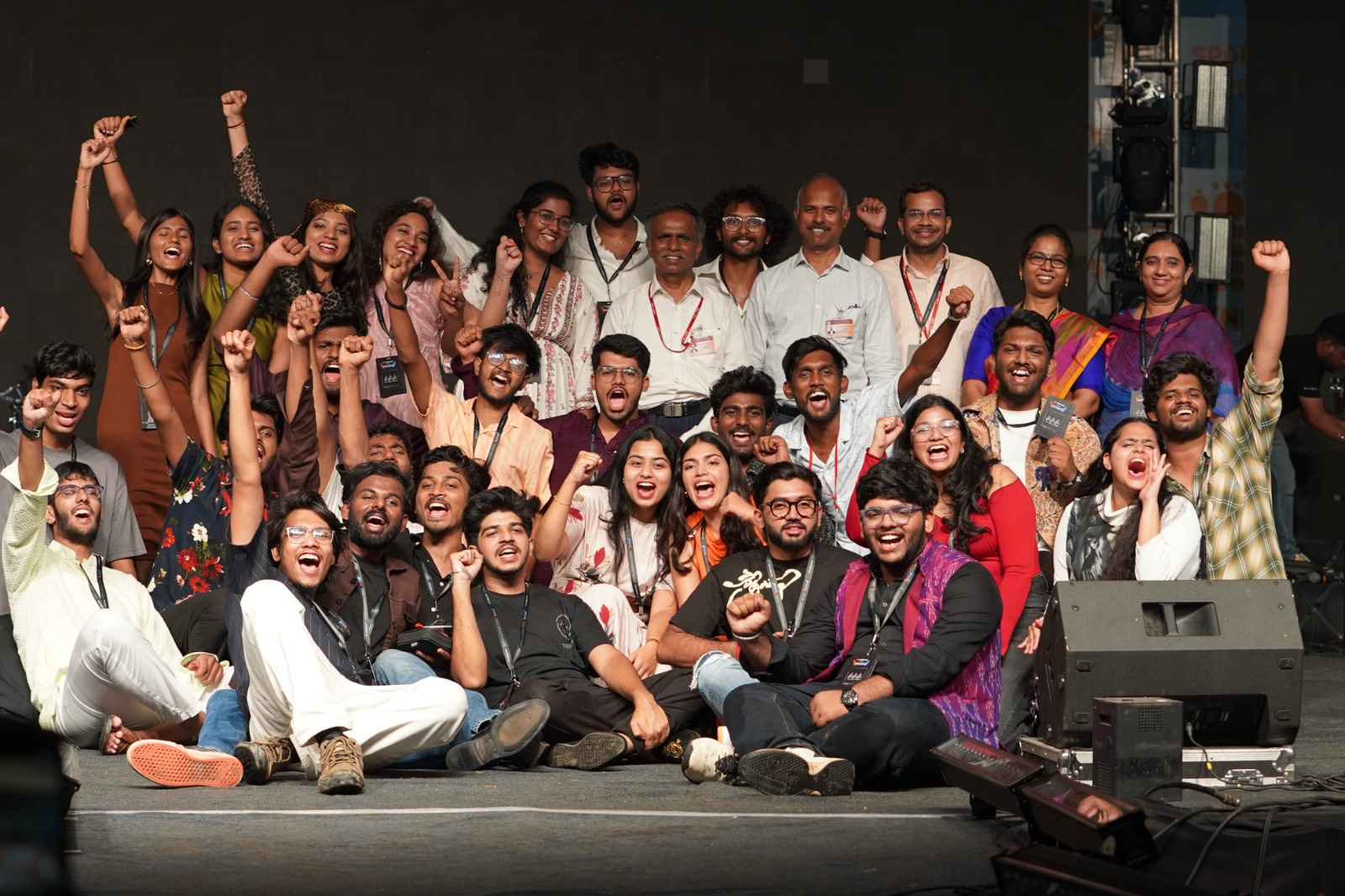Students celebrating together on a Vignana Jyothi campus stage