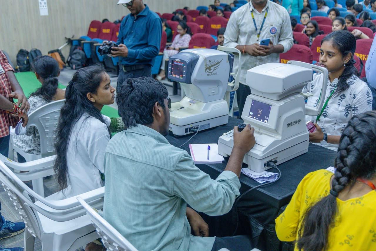 Community members receiving eye screenings at VNRVJIET